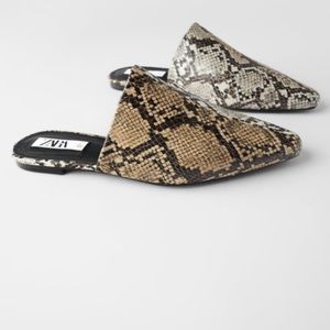Snake print pointed toe mules slip ons.
